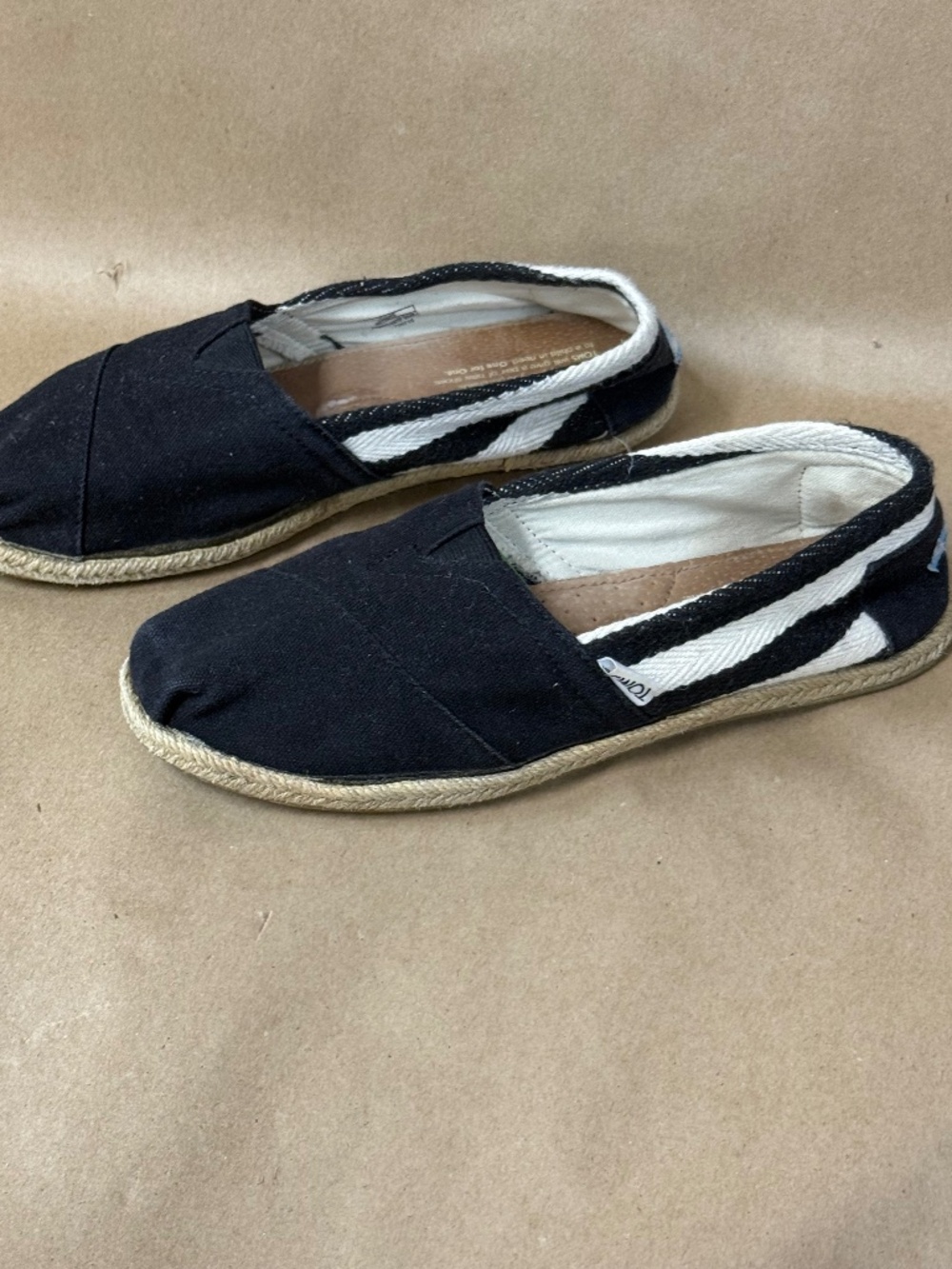 Toms black and white stripe canvas shoes. size 8